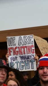Hand-drawn sign that says, "We are fighting for what's right."