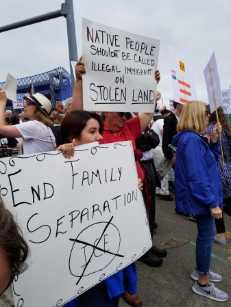 Picture of two Native Americans protesting the separation of families.